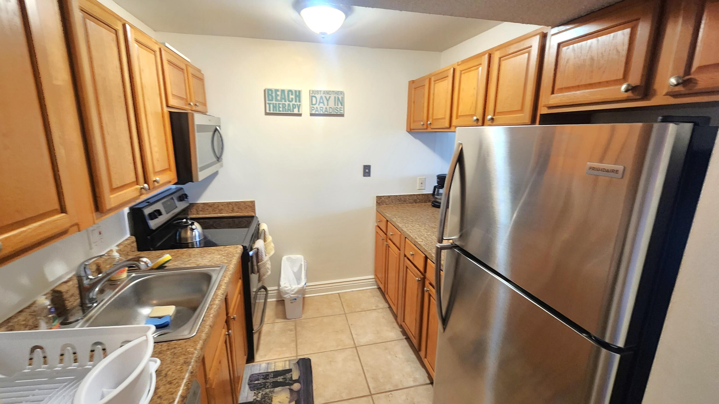 755 Dotterel Road, Unit 1404 Delray Beach, FL 33444 - Photo 7 of 18 kitchen