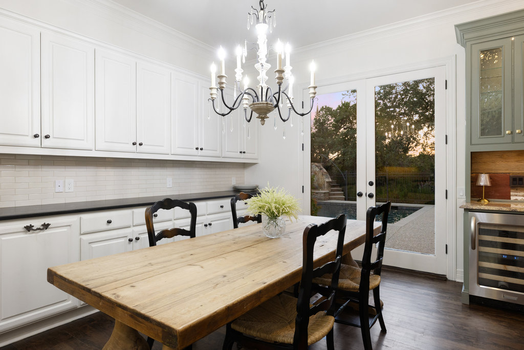 1350 Patterson Road Austin, TX 78733 - Photo 11 of 40 a view of a dining room with furniture window and wooden floor