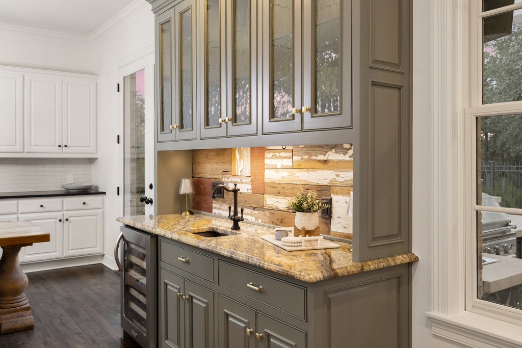 1350 Patterson Road Austin, TX 78733 - Photo 12 of 40 a kitchen with granite countertop a sink and a window