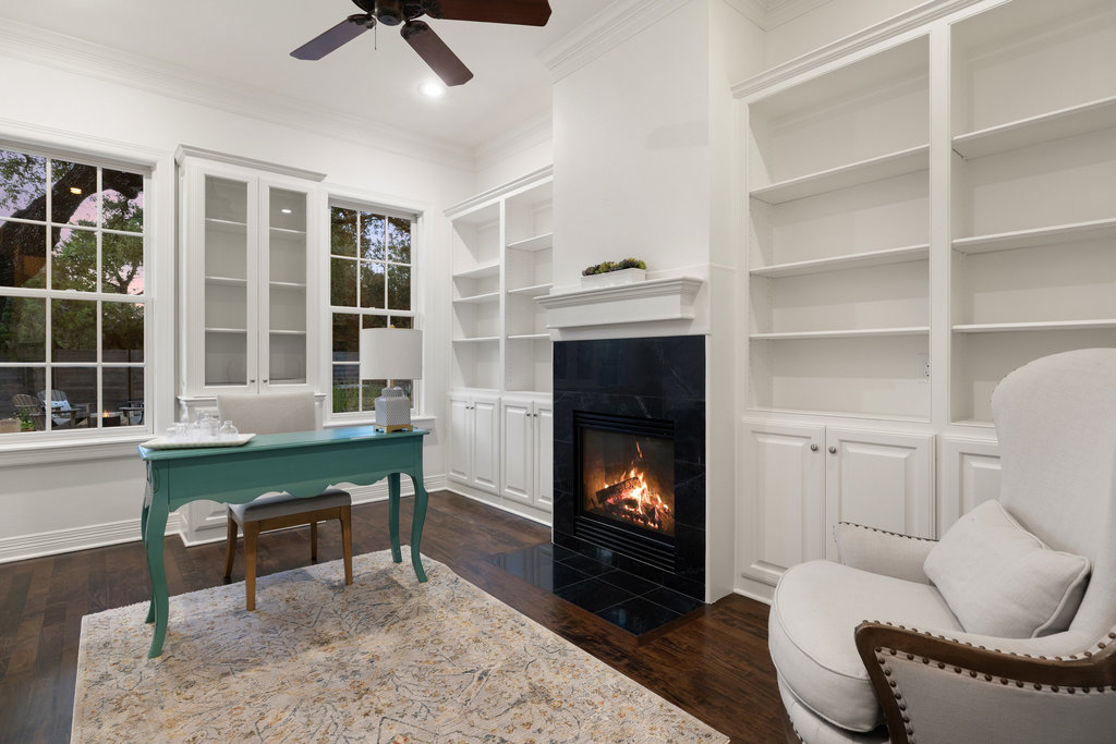1350 Patterson Road Austin, TX 78733 - Photo 14 of 40 a living room with furniture and a fireplace