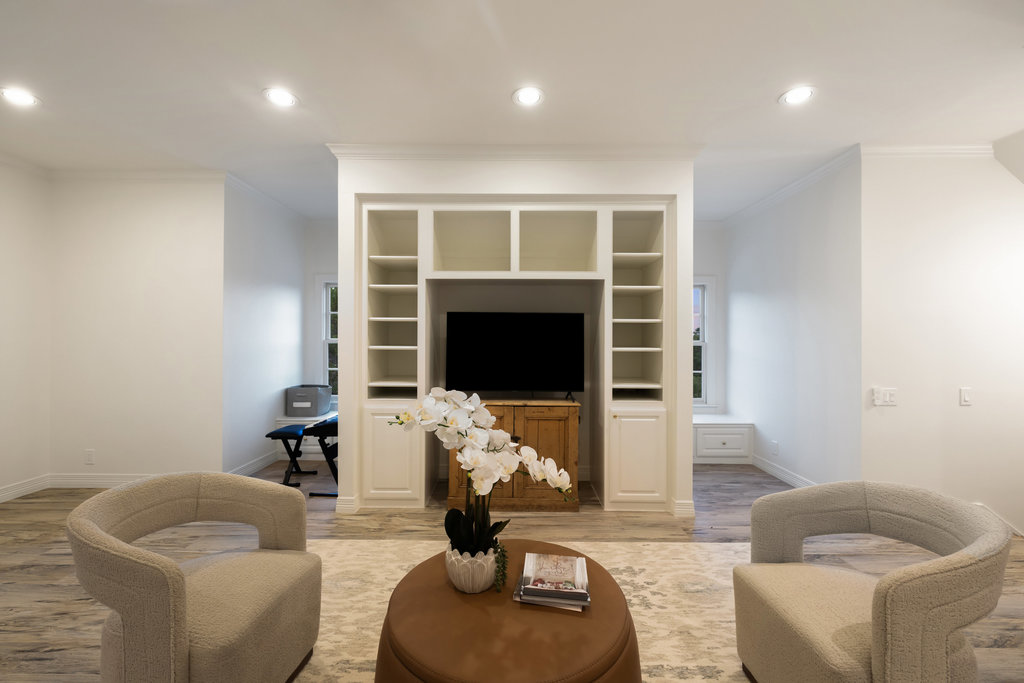 1350 Patterson Road Austin, TX 78733 - Photo 28 of 40 a living room with furniture and a fireplace