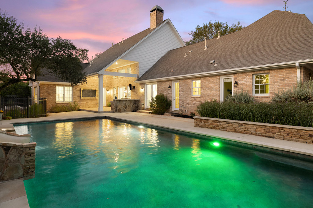 1350 Patterson Road Austin, TX 78733 - Photo 33 of 40 a view of a house with swimming pool