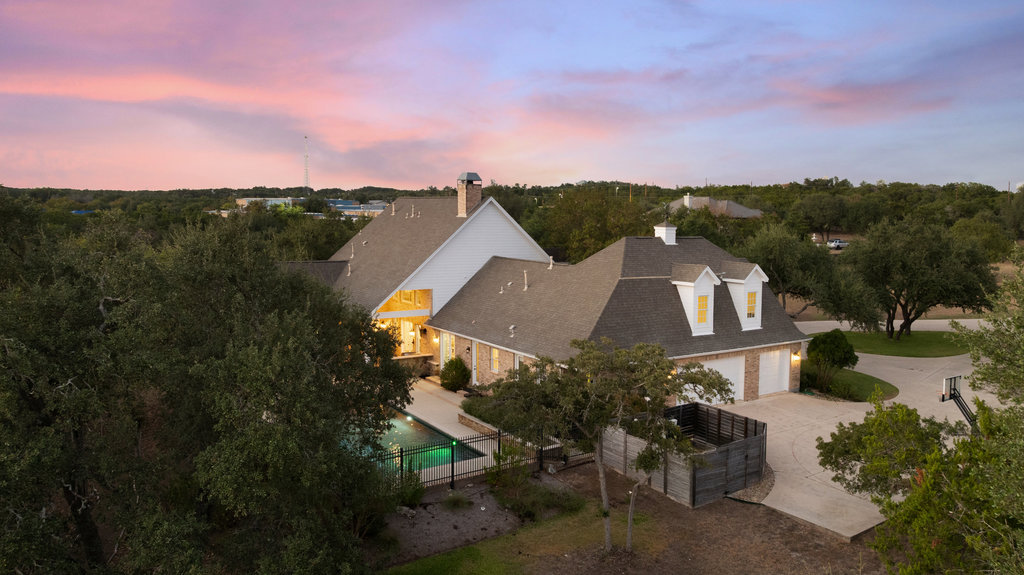 1350 Patterson Road Austin, TX 78733 - Photo 35 of 40 a aerial view of a house with a garden