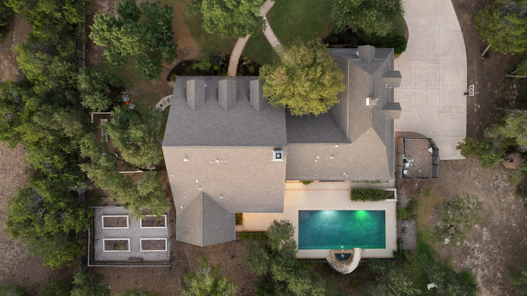 1350 Patterson Road Austin, TX 78733 - Photo 37 of 40 an aerial view of a house with outdoor space