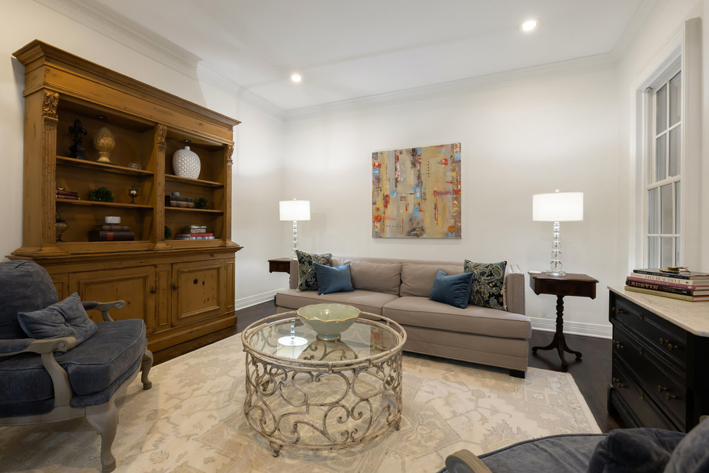 1350 Patterson Road Austin, TX 78733 - Photo 5 of 40 a living room with furniture and a fireplace