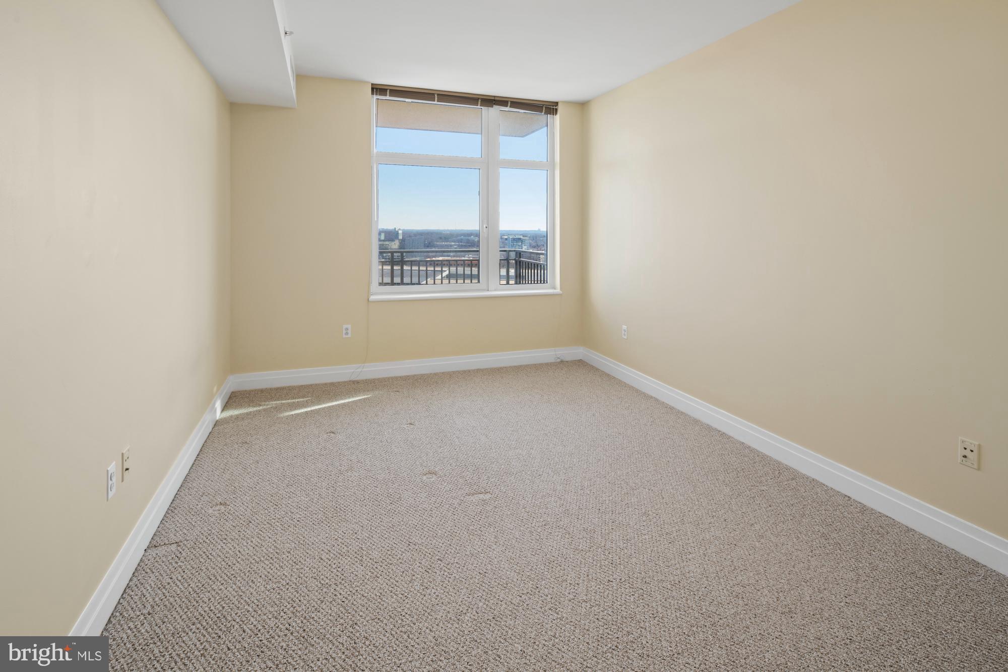 8220 Crestwood Heights Drive, Unit 1215 McLean, VA 22102 - Photo 13 of 59 an empty room with a window