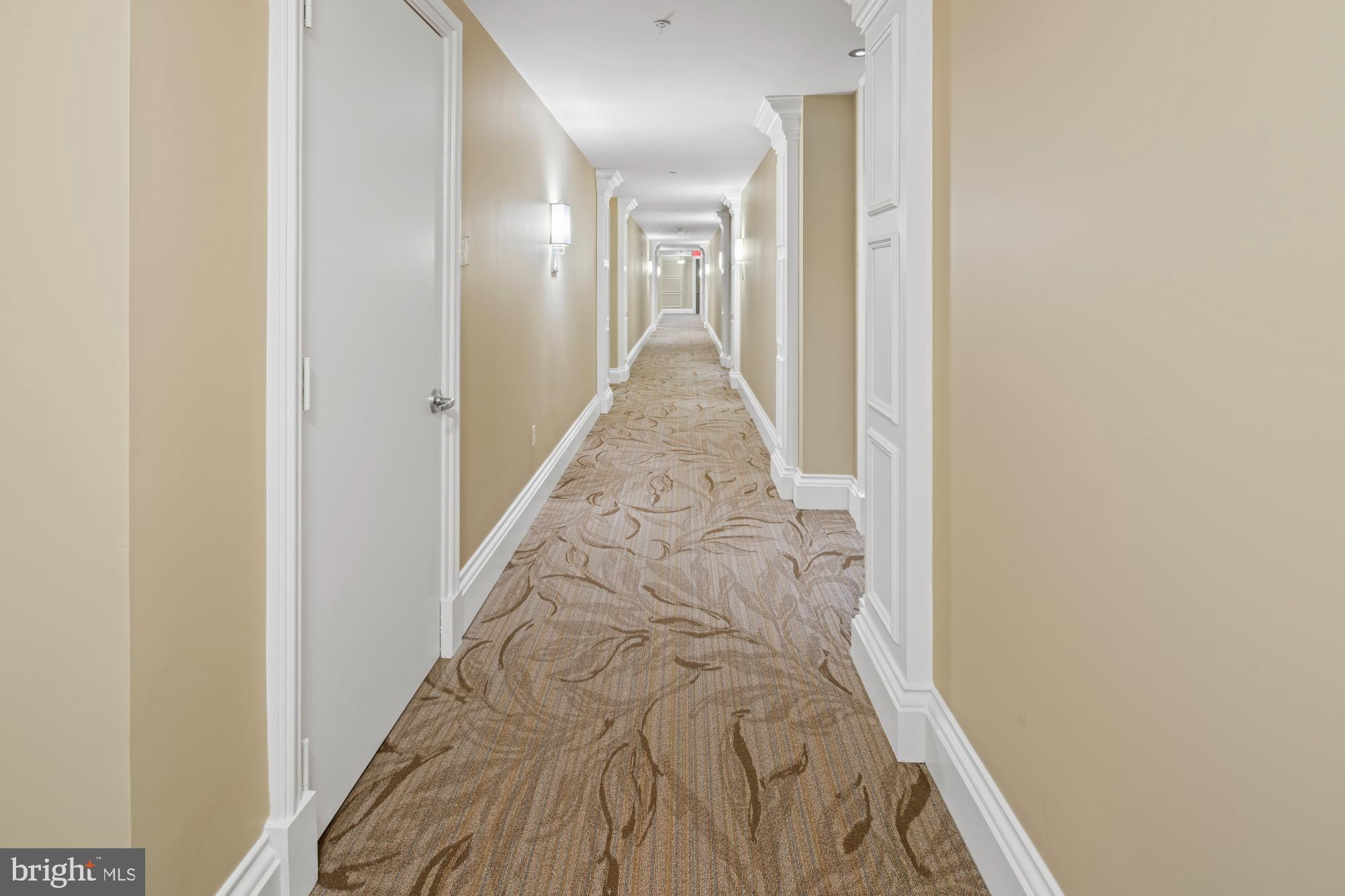 8220 Crestwood Heights Drive, Unit 1215 McLean, VA 22102 - Photo 2 of 59 Inviting corridor with elegant design.
