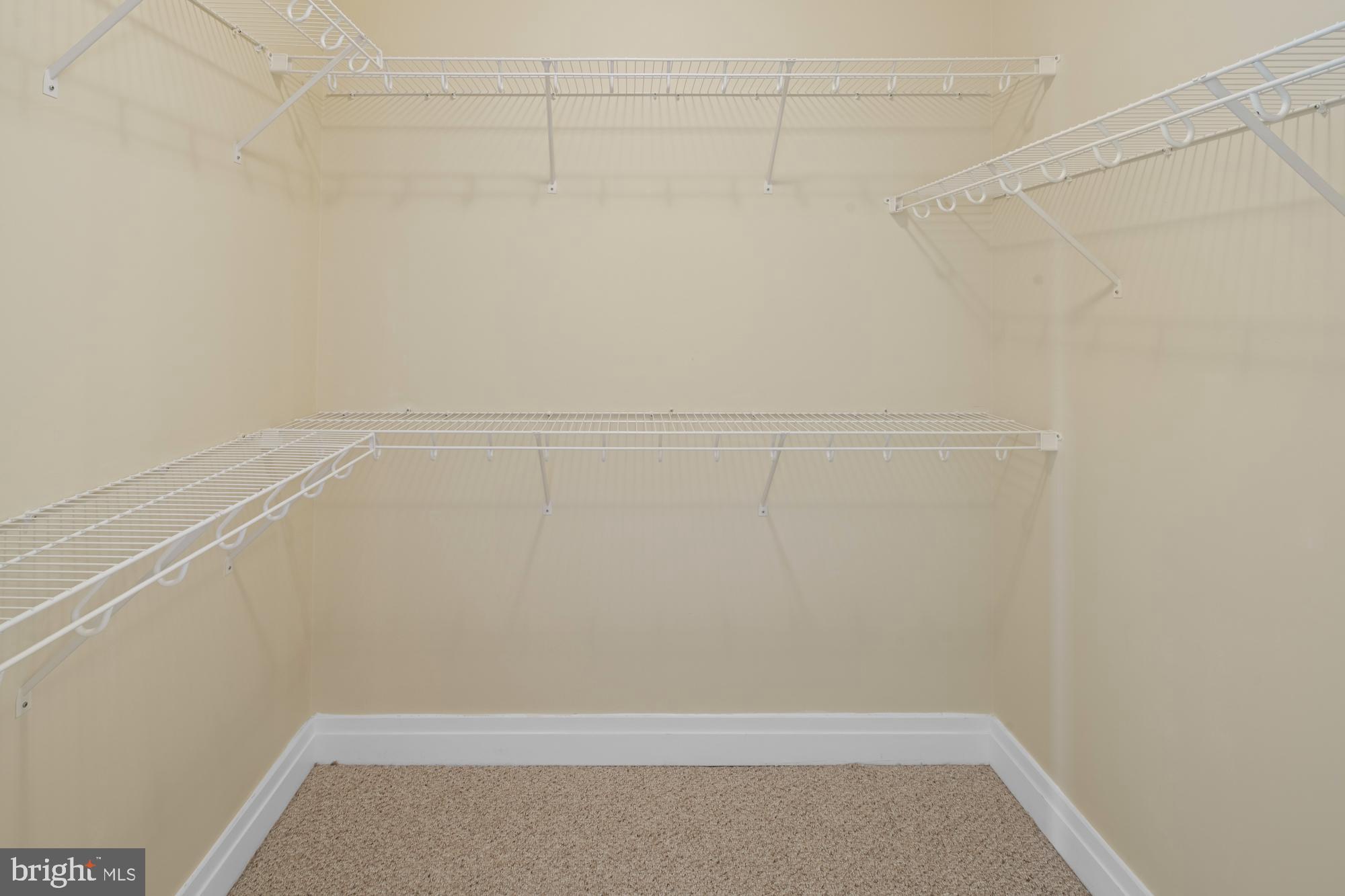 8220 Crestwood Heights Drive, Unit 1215 McLean, VA 22102 - Photo 22 of 59 a view of a room with racks on the wall