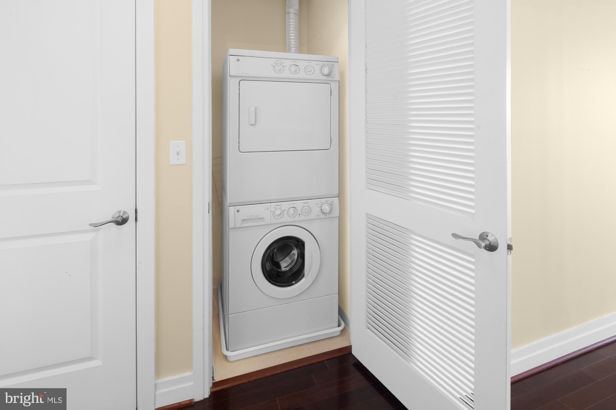 8220 Crestwood Heights Drive, Unit 1215 McLean, VA 22102 - Photo 35 of 59 a utility room with dryer and washer