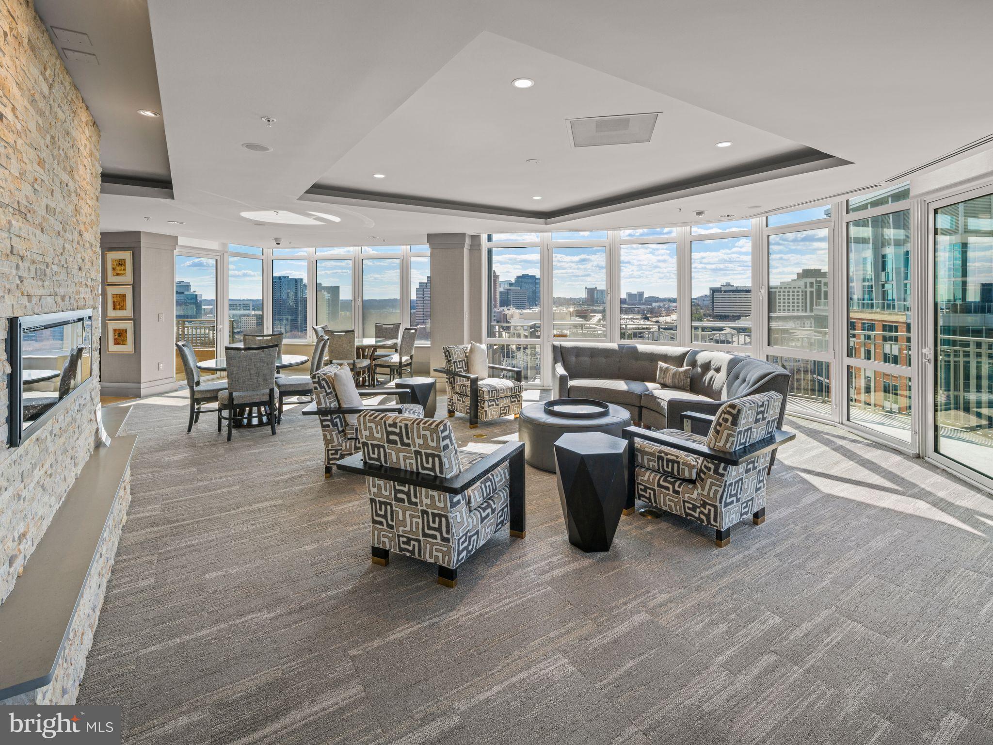 8220 Crestwood Heights Drive, Unit 1215 McLean, VA 22102 - Photo 40 of 59 a living room with furniture and large windows