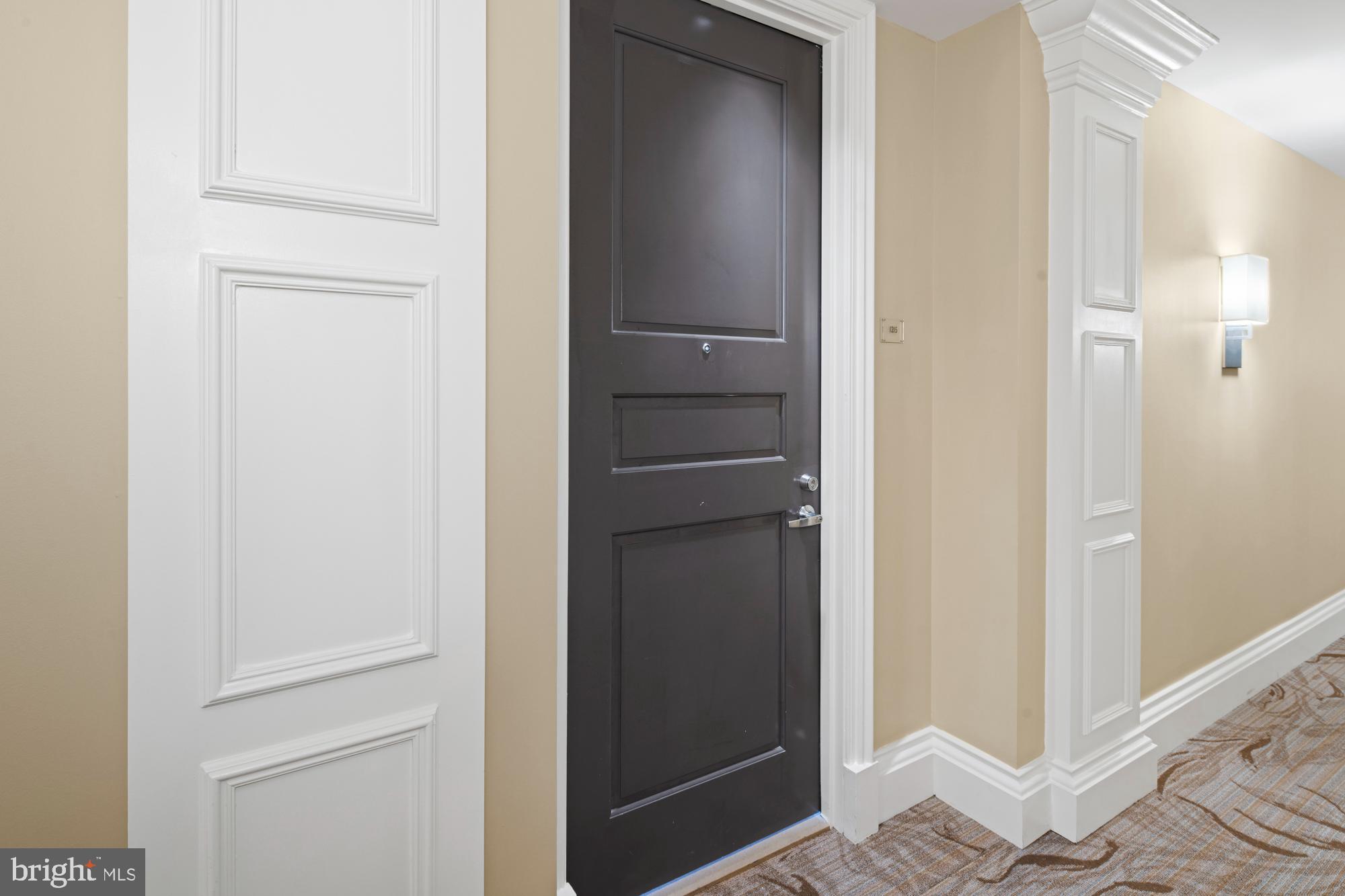 8220 Crestwood Heights Drive, Unit 1215 McLean, VA 22102 - Photo 4 of 59 Elegant entryway with modern charm.