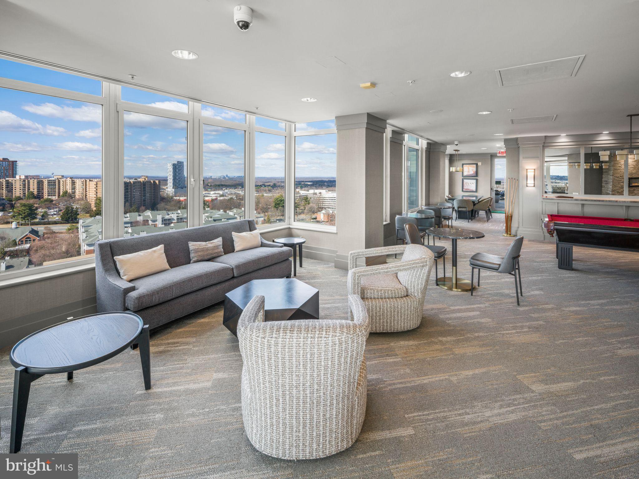 8220 Crestwood Heights Drive, Unit 1215 McLean, VA 22102 - Photo 41 of 59 a living room with furniture and a large window