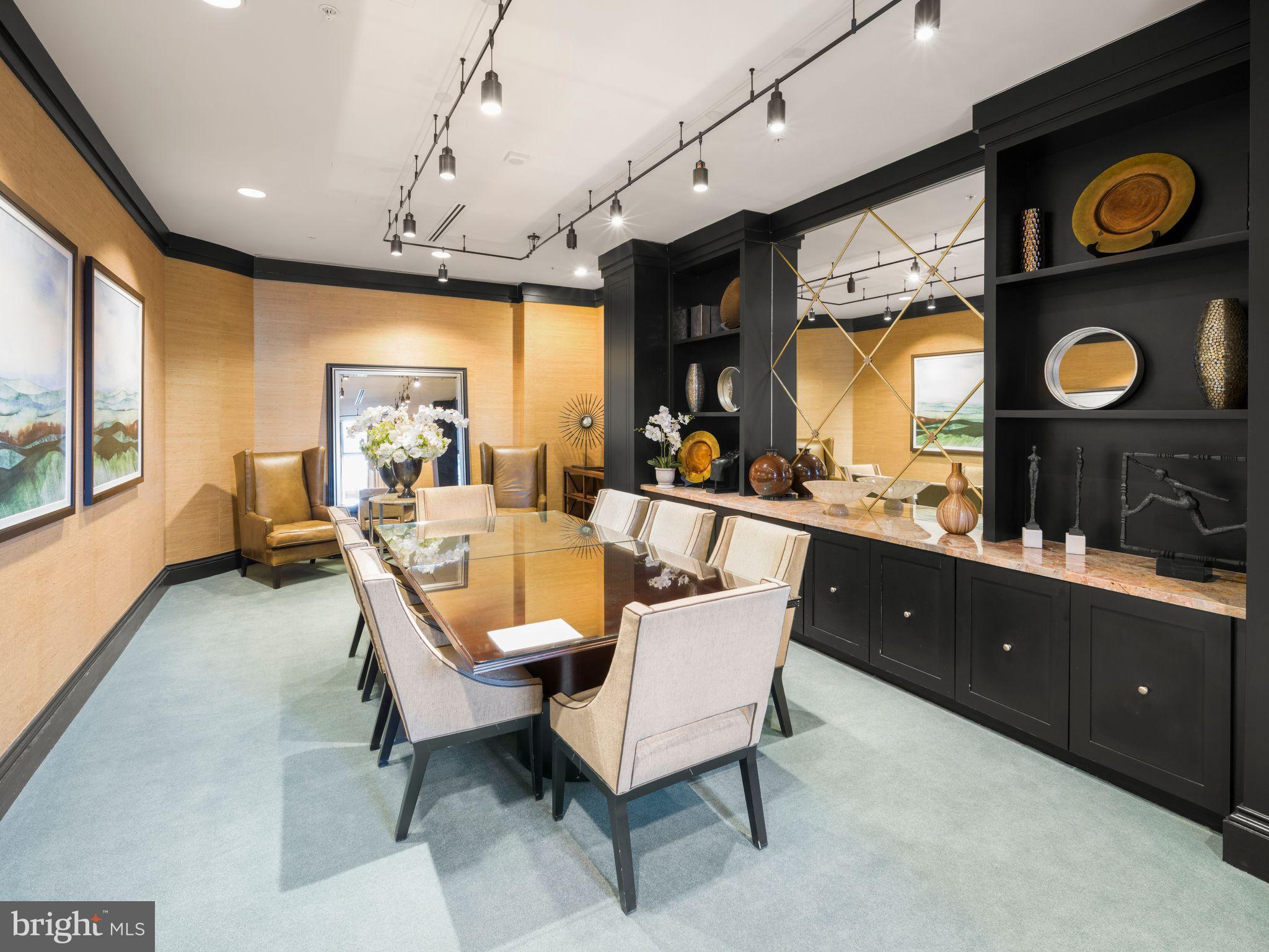 8220 Crestwood Heights Drive, Unit 1215 McLean, VA 22102 - Photo 50 of 59 a living room with furniture and a large window