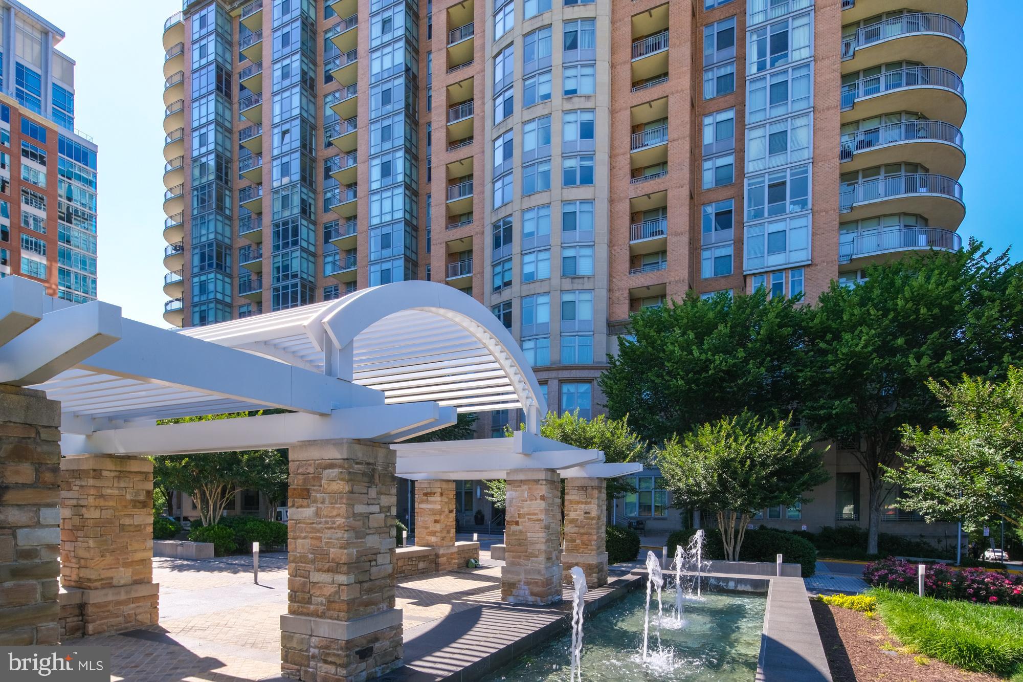 8220 Crestwood Heights Drive, Unit 1215 McLean, VA 22102 - Photo 58 of 59 a view of a building with garden and patio