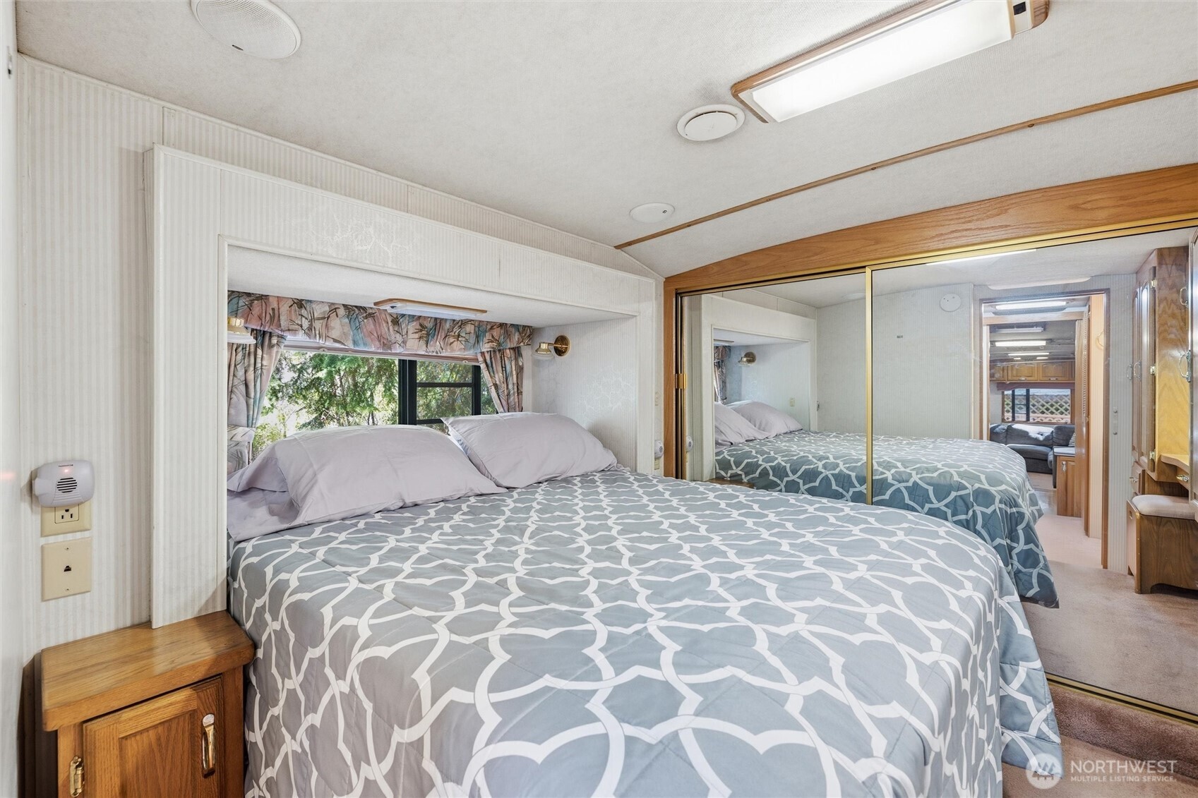 1028 Maple Lane Maple Falls, WA 98266 - Photo 11 of 17 a bedroom with a large bed and a window