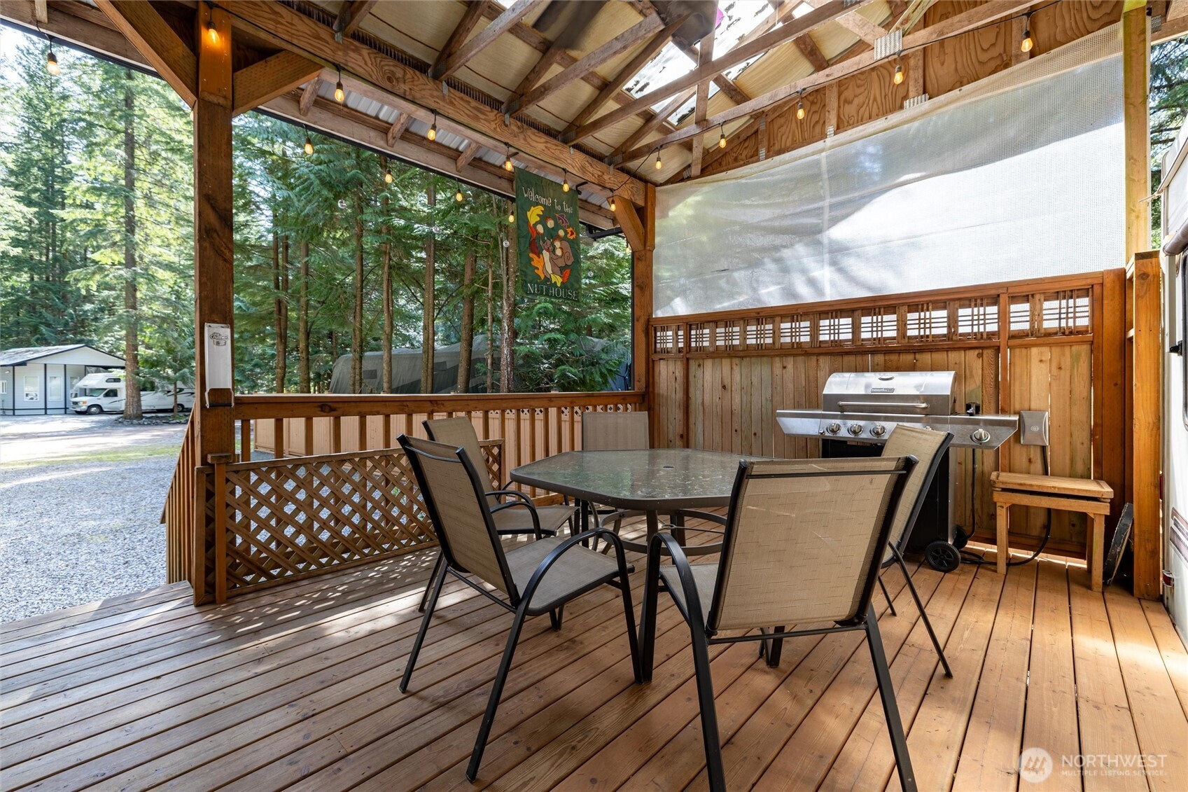 1028 Maple Lane Maple Falls, WA 98266 - Photo 3 of 17 a view of a chairs and table in the balcony