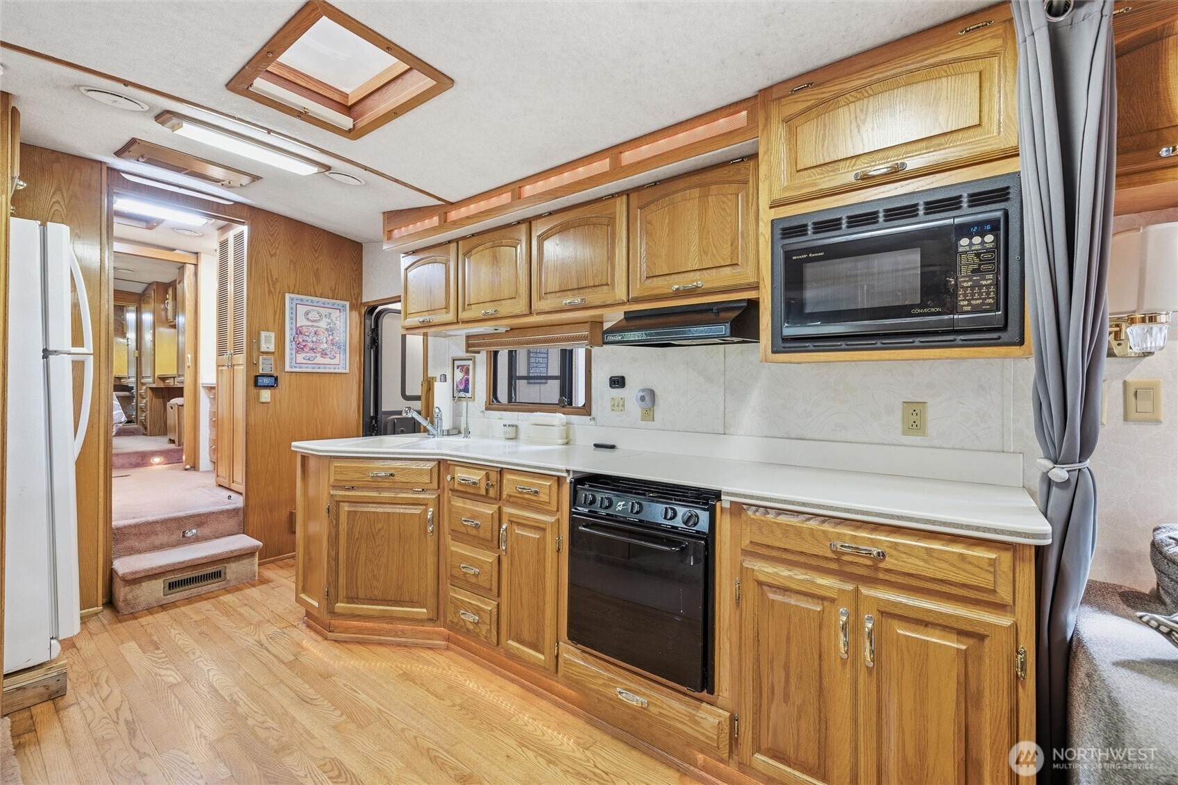 1028 Maple Lane Maple Falls, WA 98266 - Photo 9 of 17 a kitchen with stainless steel appliances granite countertop a stove and a sink