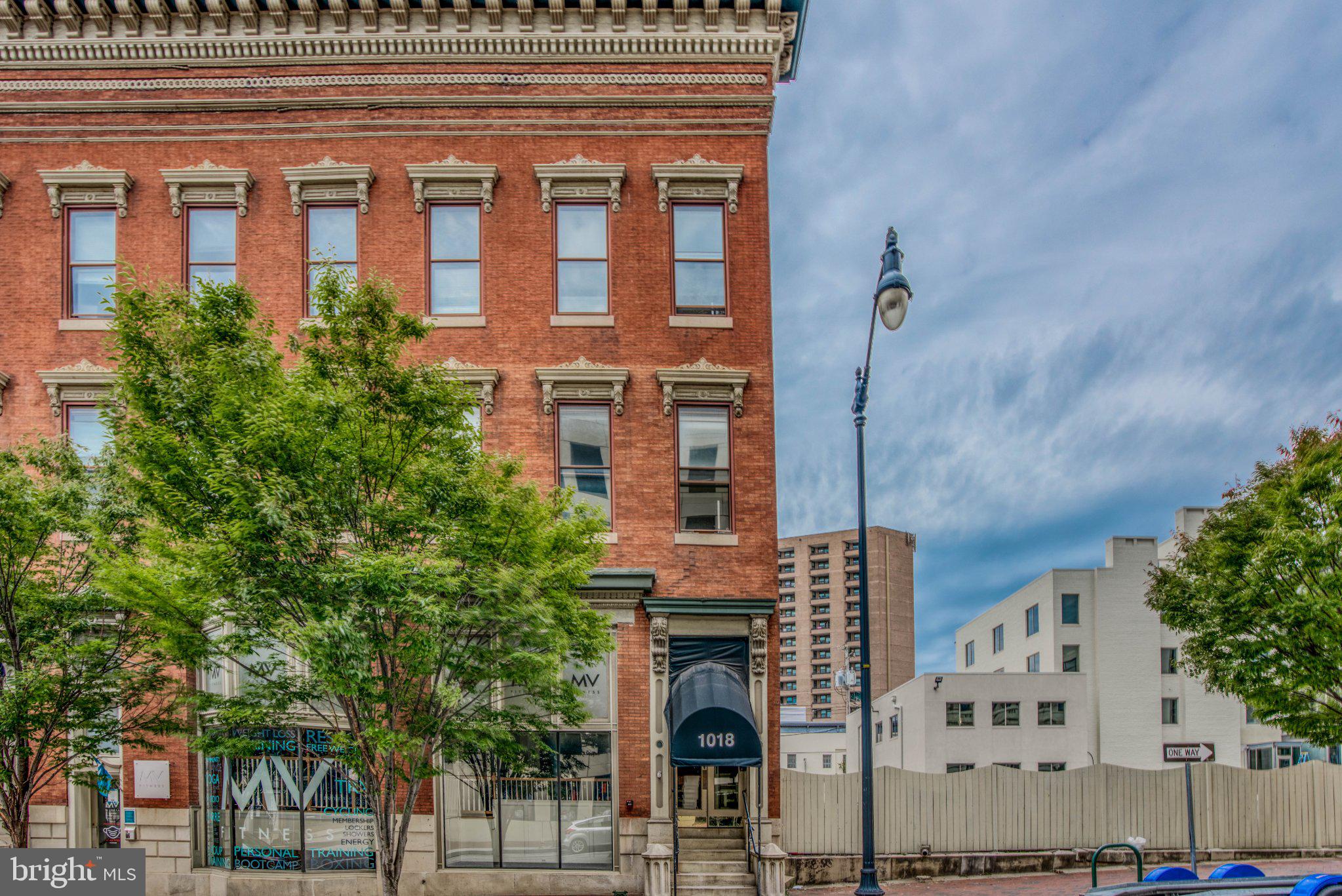 Historic brick building in urban setting.
