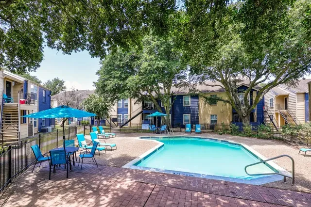 a view of swimming pool with a yard