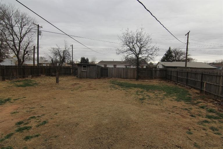4407 37th Street Lubbock, TX 79414 - Photo 10 of 10 a backyard of a house with lots of green space