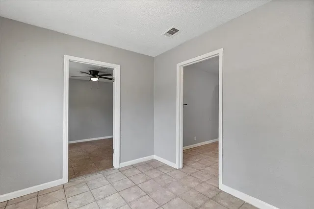 an empty room and closet area