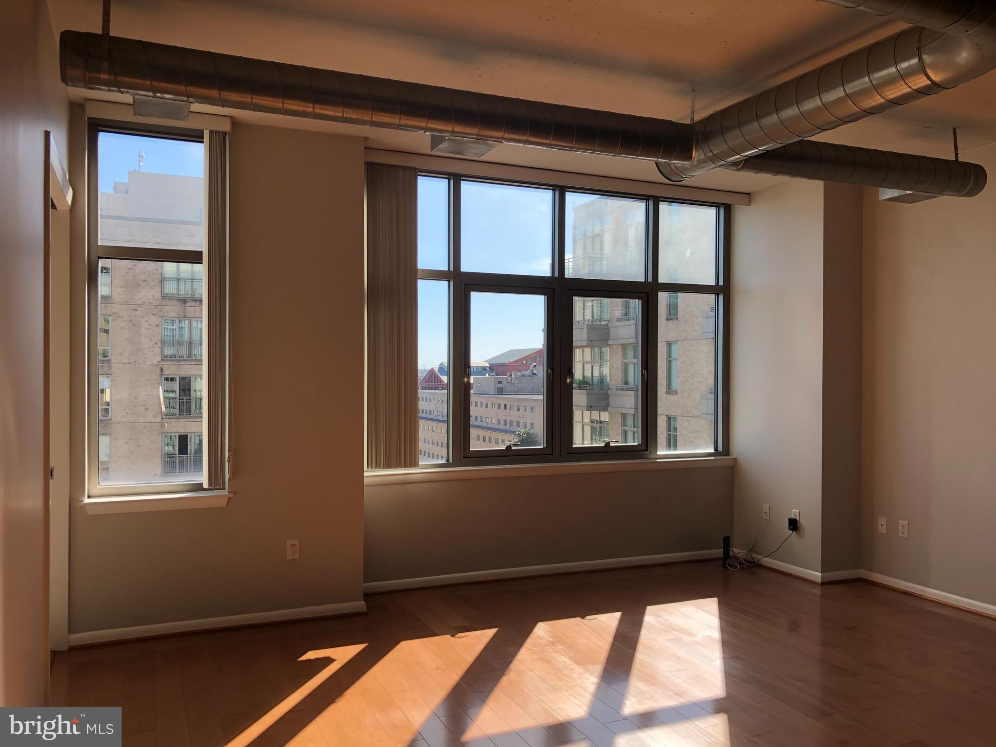 811 4th Street Northwest, Unit 1019 Washington, DC 20001 - Photo 11 of 38 a view of an empty room with a window