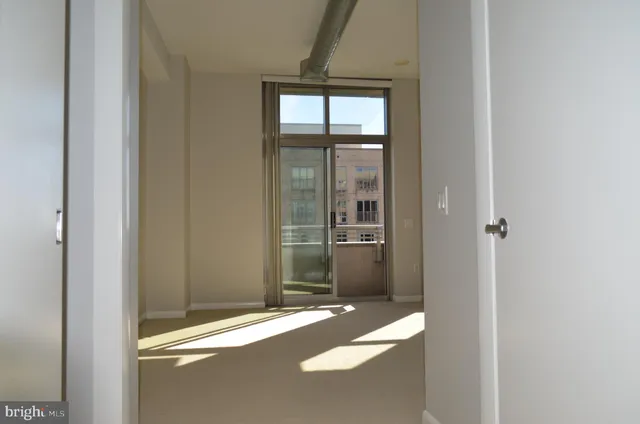 a view of entryway with bathroom