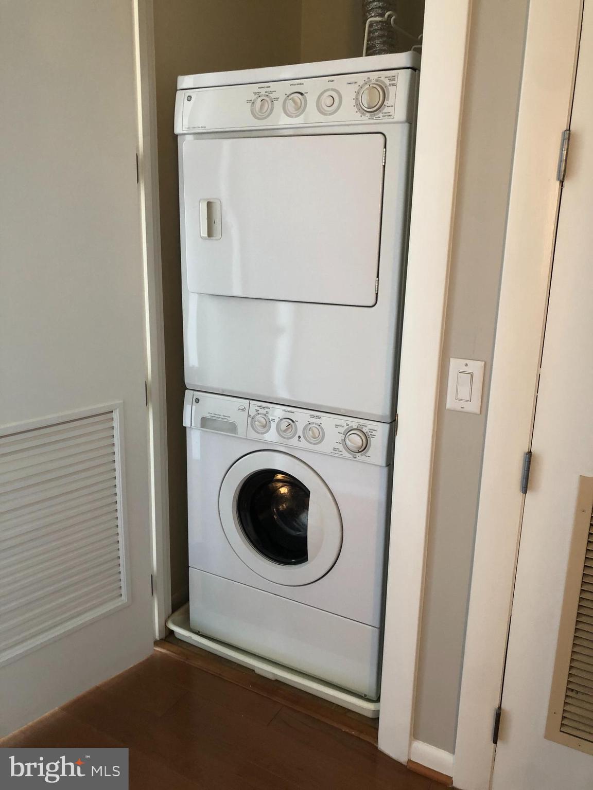 811 4th Street Northwest, Unit 1019 Washington, DC 20001 - Photo 23 of 38 a utility room with dryer and washer