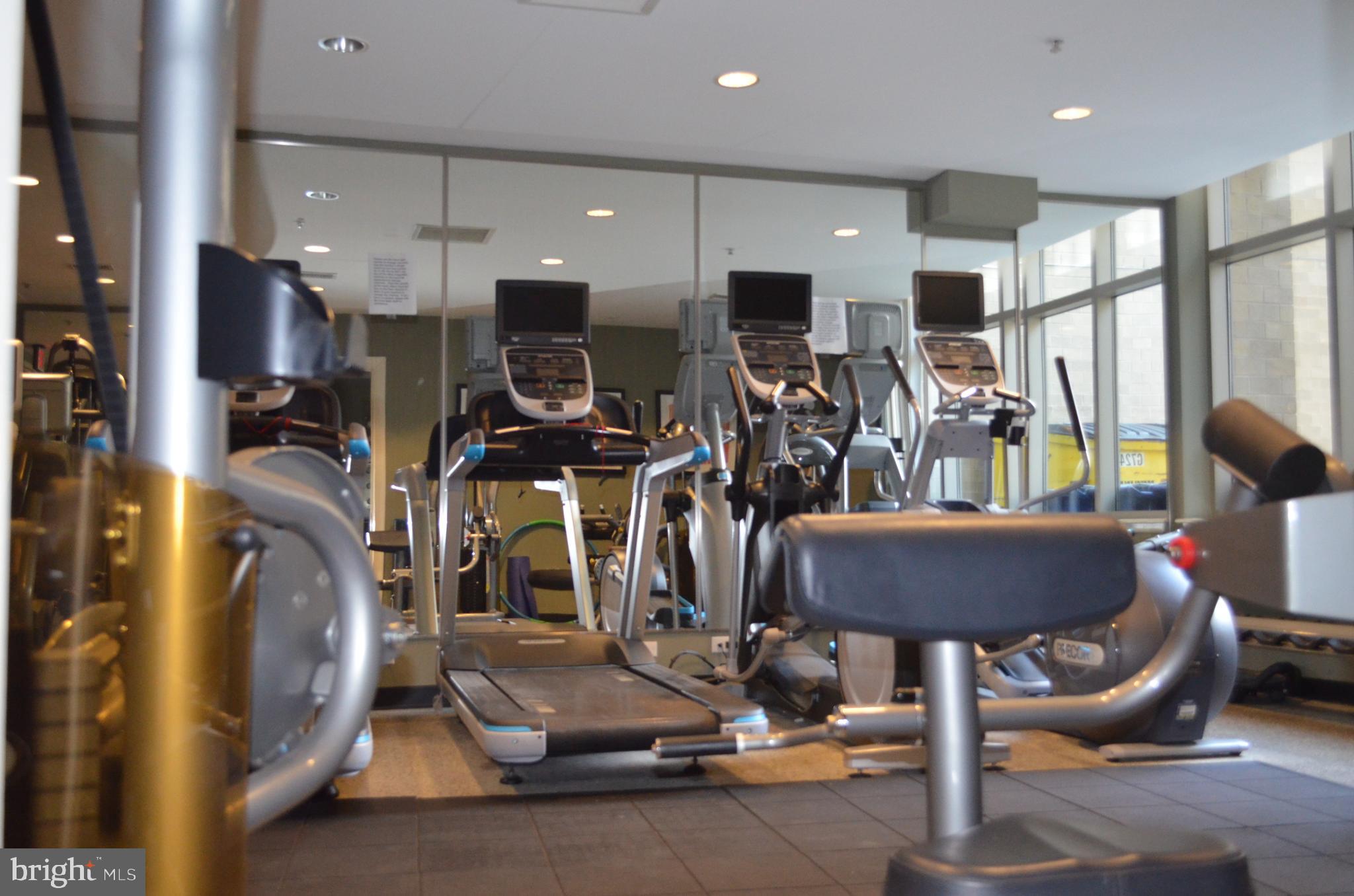 811 4th Street Northwest, Unit 1019 Washington, DC 20001 - Photo 25 of 38 a view of a room with gym equipment