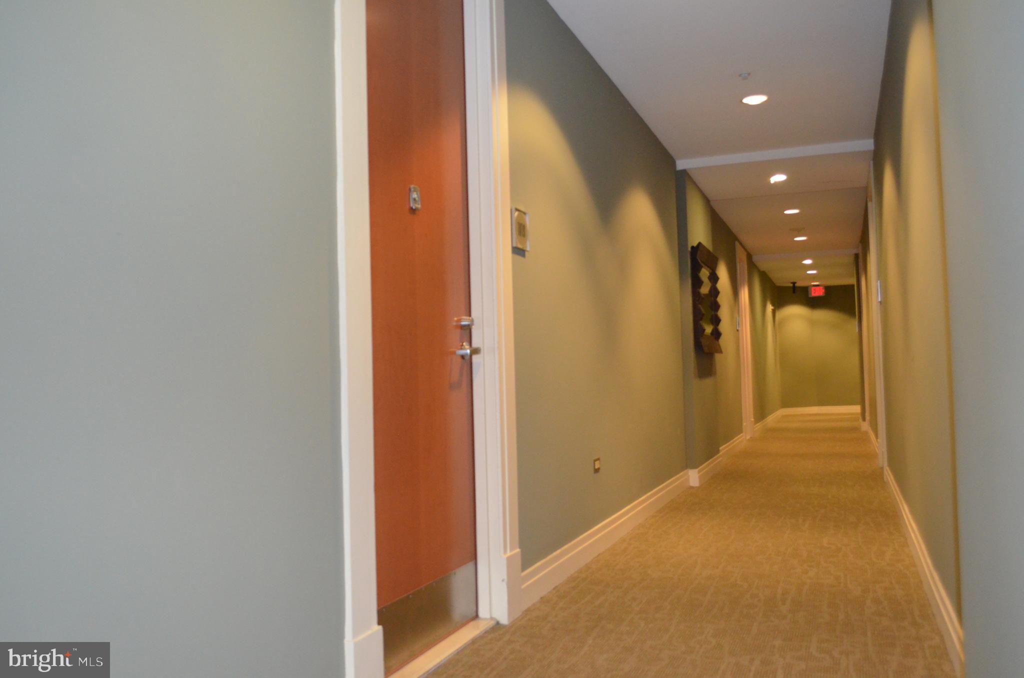 811 4th Street Northwest, Unit 1019 Washington, DC 20001 - Photo 6 of 38 a view of a hallway with a bathroom