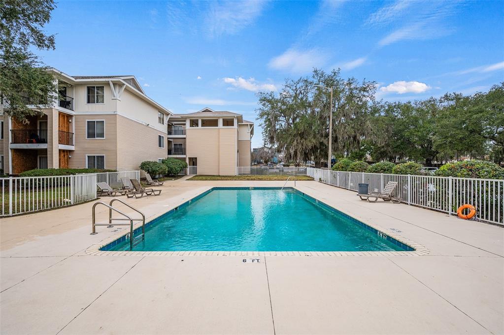 3921 Southwest 34th Street, Unit 208 Gainesville, FL 32608 - Photo 32 of 33 a view of a backyard with a patio