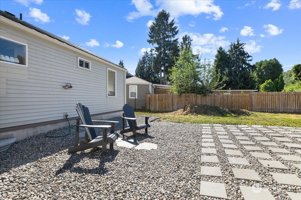 3304 Southeast 6th Street Renton, WA 98058 - Photo 20 of 30 a view of a backyard with a sitting area