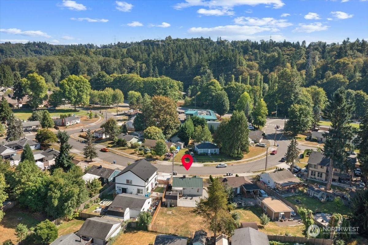 3304 Southeast 6th Street Renton, WA 98058 - Photo 30 of 30 an aerial view of residential houses with outdoor space
