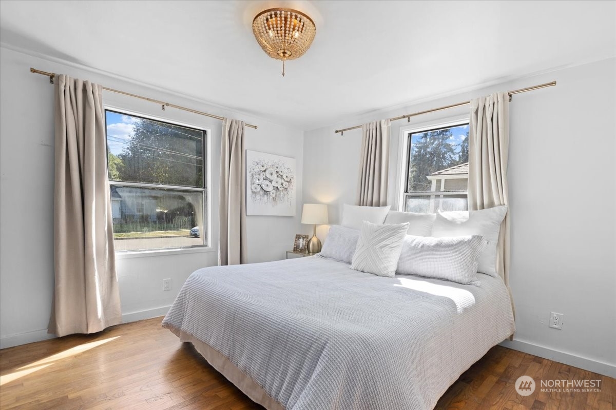 3304 Southeast 6th Street Renton, WA 98058 - Photo 9 of 30 a bedroom with a bed and a window