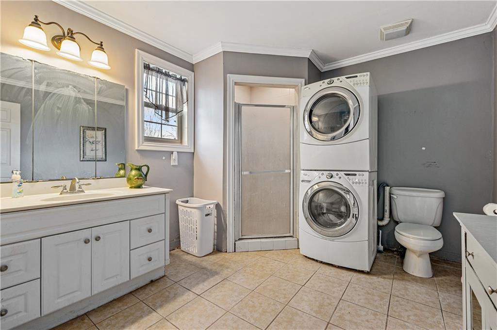 2099 Marshall Road Monaca, PA 15061 - Photo 13 of 24 a utility room with sink dryer and washer