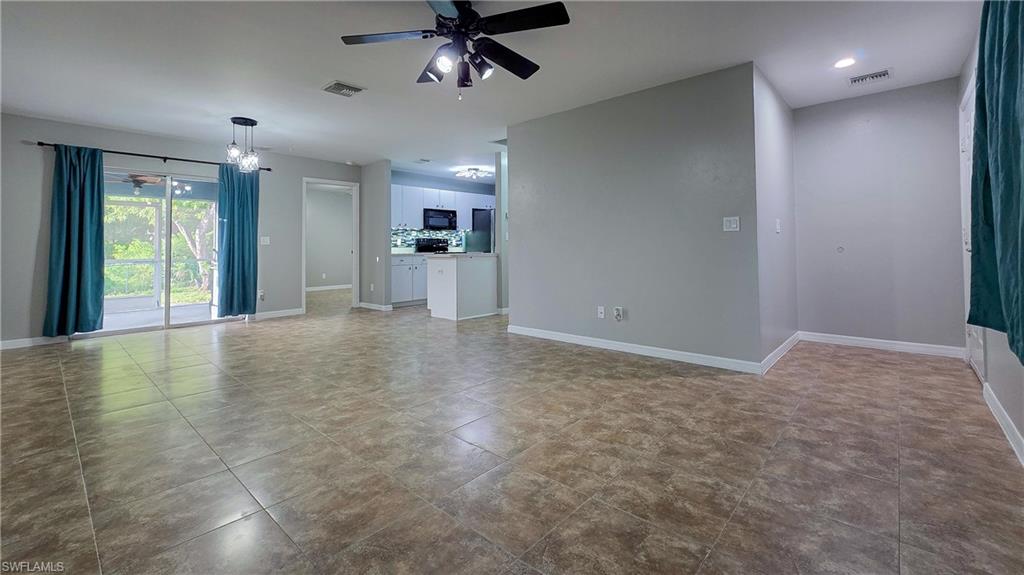 7319 Albany Road Fort Myers, FL 33967 - Photo 5 of 27 a view of an empty room with a window