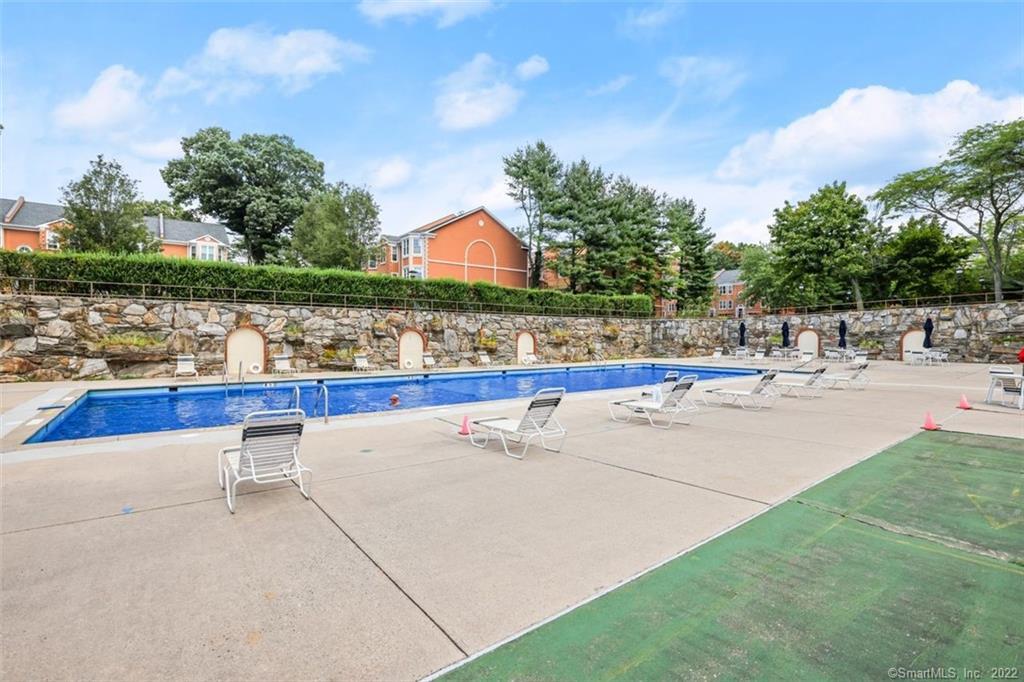 2625 Park Avenue, Unit 6M Bridgeport, CT 06604 - Photo 16 of 21 a view of swimming pool with outdoor seating and plants