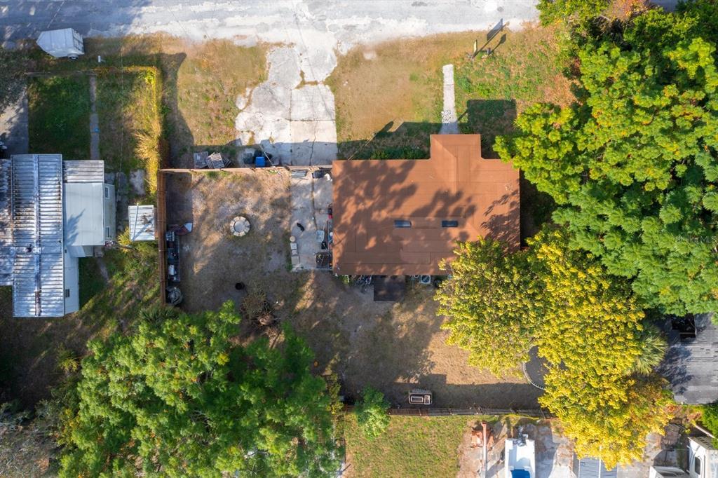 1846 Abacus Road Holiday, FL 34690 - Photo 18 of 20 an aerial view of a house with a yard and large trees