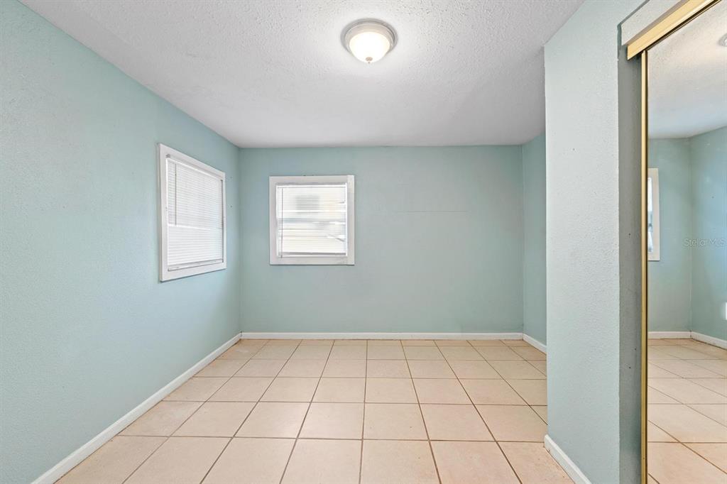 1846 Abacus Road Holiday, FL 34690 - Photo 9 of 20 a view of an empty room and window