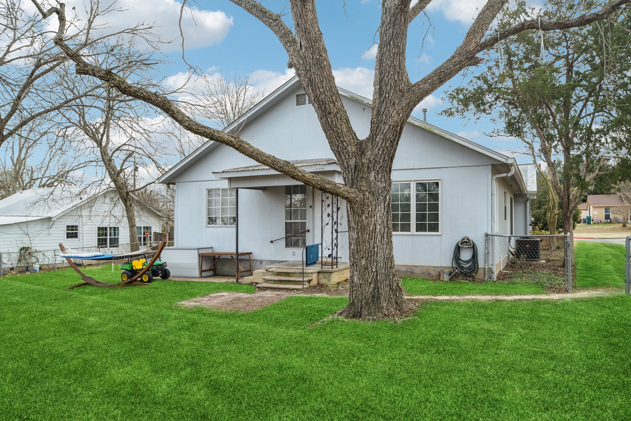 528 Old McDade Road Elgin, TX 78621 - Photo 7 of 30 Rear view of property with virtual green grass