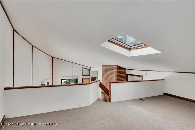 a view of a livingroom with furniture
