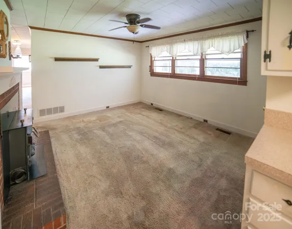 en empty room with windows