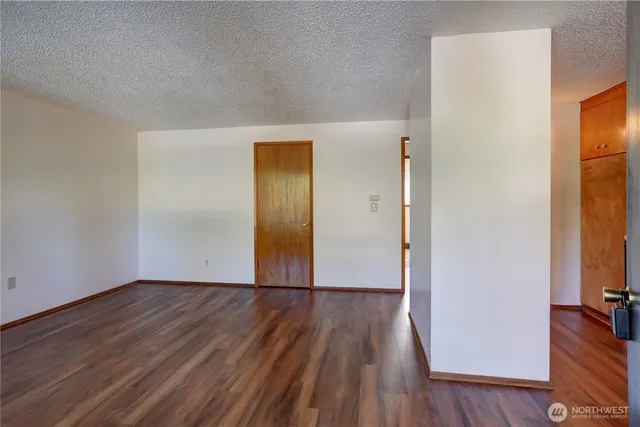 a kitchen with a stove and a refrigerator