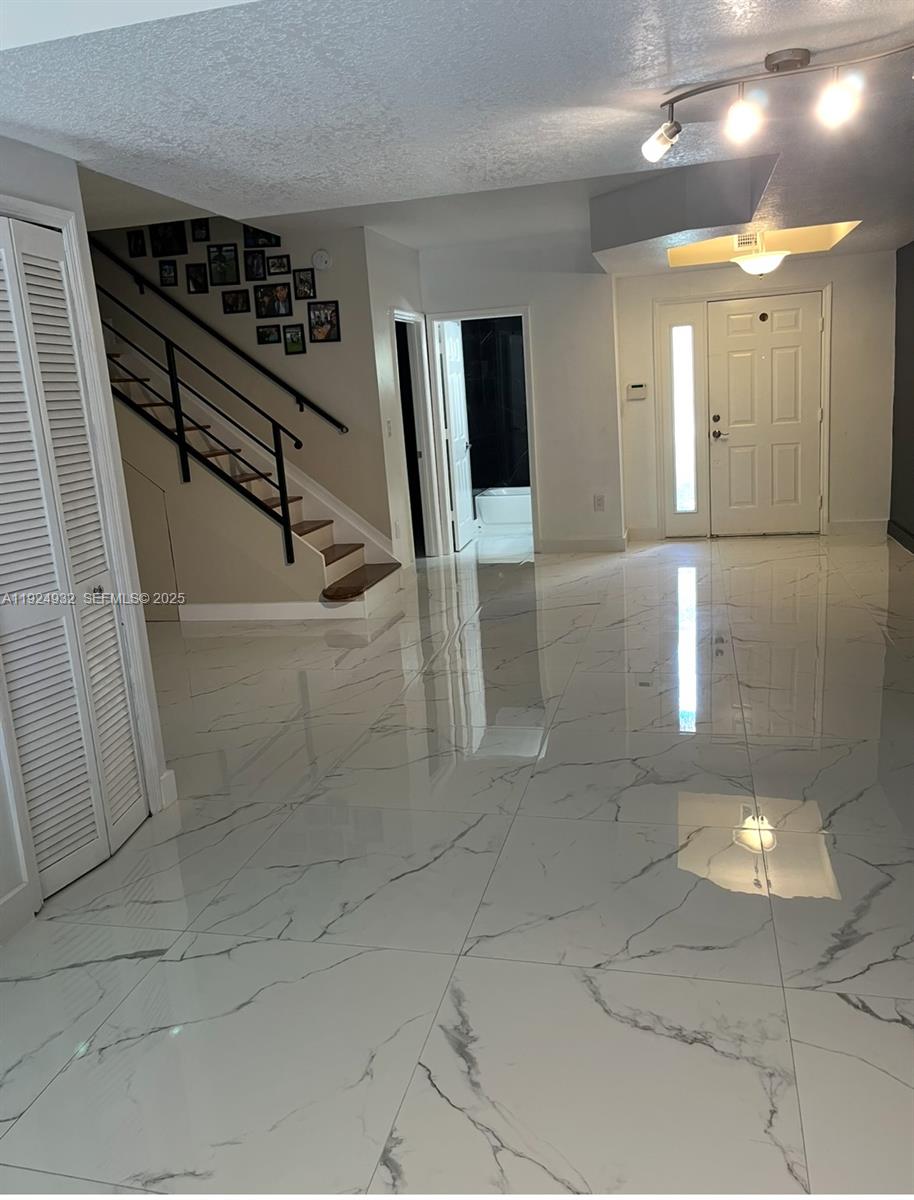 10150 Southwest 88th Street, Unit 103 Miami, FL 33176 - Photo 12 of 29 a bathroom with shower
