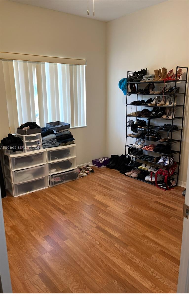 10150 Southwest 88th Street, Unit 103 Miami, FL 33176 - Photo 17 of 29 a view of room with gym equipment