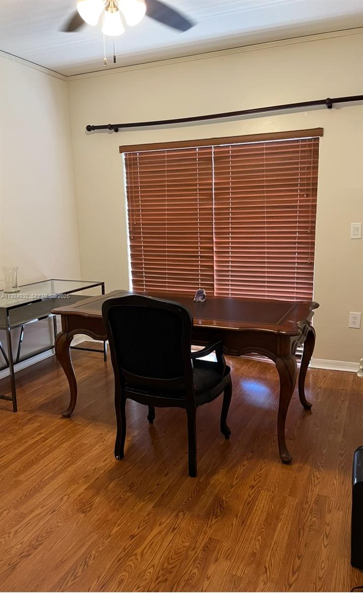10150 Southwest 88th Street, Unit 103 Miami, FL 33176 - Photo 18 of 29 a reading room with furniture and a window