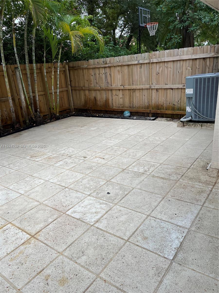 10150 Southwest 88th Street, Unit 103 Miami, FL 33176 - Photo 24 of 29 a view of a backyard