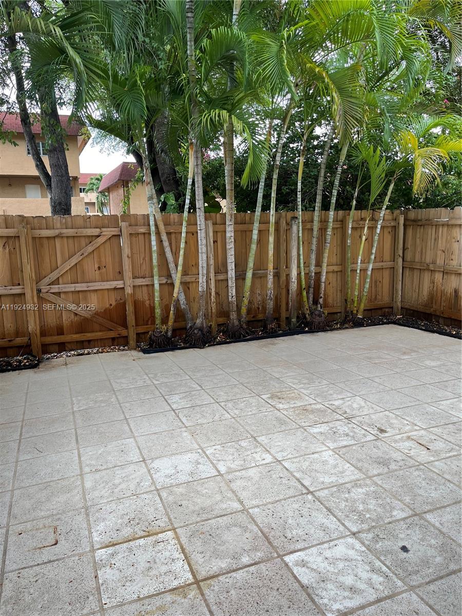 10150 Southwest 88th Street, Unit 103 Miami, FL 33176 - Photo 25 of 29 a view of a backyard