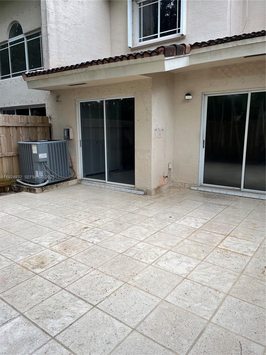 10150 Southwest 88th Street, Unit 103 Miami, FL 33176 - Photo 26 of 29 a view of an empty room