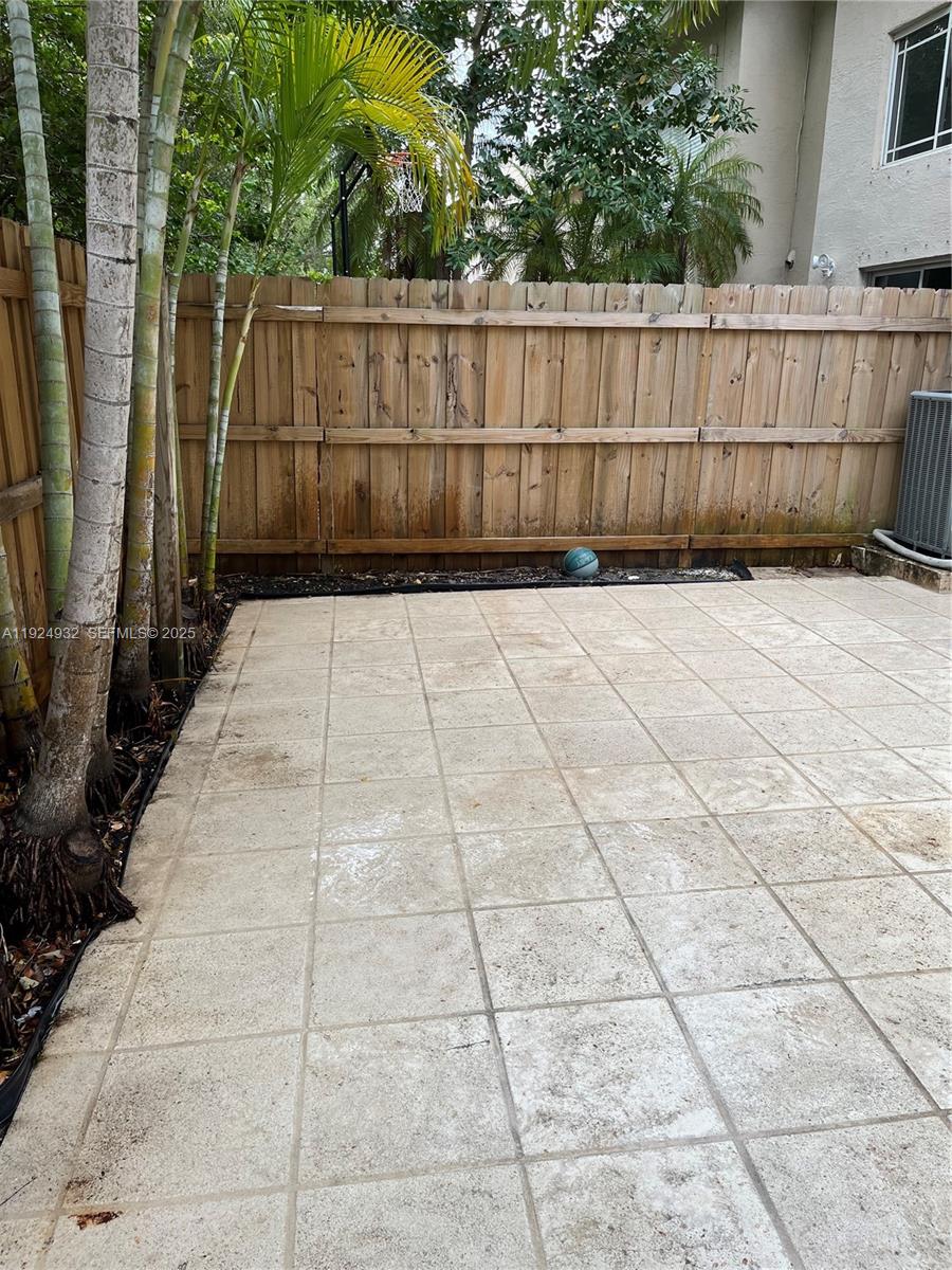 10150 Southwest 88th Street, Unit 103 Miami, FL 33176 - Photo 27 of 29 a view of a backyard